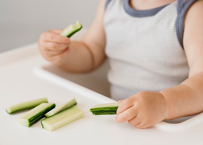 Babies generally start to self-feed at 6 months of age