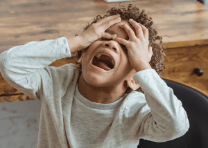 While undergoing temper tantrums, kids try to express themselves through crying or running away to grab your attention.