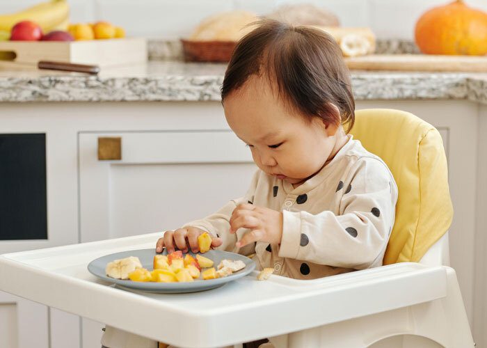 Most babies of this age can eat finger foods by grasping the food between their thumb and forefinger. 